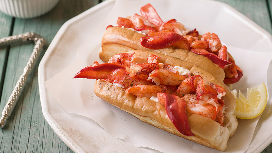 Luke's Lobster signature dishes Maine-style Lobster RollCrab RollFried Haddock SandwichSpicy Honey Butter Rolls